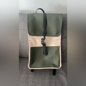 Rains brand is from Denmark. It is all waterproof.